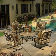 Lokatse home 42.1 outdoor round cast wrought iron patio metal dining table with umbrella hole, steel frame for backyard lawn balcony deck, black $149.99 usually ships within 3 to 5 days. How To Identify Quality Wrought Iron Furniture Today S Patio