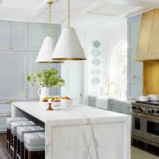 Inset maple cabinetry, white subway tile, window and door trim details, bin pulls and an apron front sink all were selected to keep with the. Elegant Blue Kitchen Design What Makes It Timeless Hello Lovely