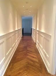 Wall Mouldings Herringbone Floors Leading To Living White Wood Paneling Painting Wood Paneling White Paneling