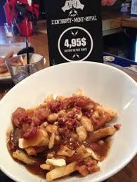 Poutine and a smoked meat sandwich 1024x768. 230 Poutine Wars Ideas Poutine Recipe Poutine Recipes