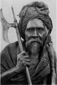 Indian man (Khond, Chota Nagpoor/Nagpur) with a bulova axe, from a  collection of photographs taken by Egon Freiherr von Eickstedt (10 April  1892