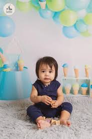 If he can easily cope, offer him something more complicated. 1 Year Old Baby And Family Celebration Photoshoot Singapore