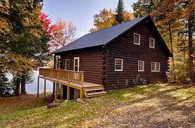 At the lake, there is a dock and small beach for swimming or putting in your canoe or kayak and a fire pit that guests are welcome to. Morton Furbish Vacation Rentals