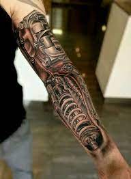 Pin By Job Ferguson On Tattoo Black Grey Biomechanical Tattoo Cyborg Tattoo Gear Tattoo