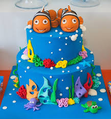 Cross cupcake cake for baby boy baptism (see note for recipes and details). Kara S Party Ideas Finding Nemo Themed Birthday Party