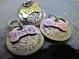 The steel pet id tags are good in quality and one can get the name of the dog engraved on them. Dog Bone Pet Id Tag Dog Tag Pet Tag Dog Collar Tag Etsy Dog Tags Pet Dog Collar Tags Pet Tags Personalized