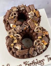 The first documented form of the cake was seen in ferrara, italy, though some forms of the cake have myths surrounding their origins. Chocolate Crunchie Number Cake Birthday Cakes