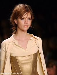Short Hairstyle With Layers And Parted Off Center