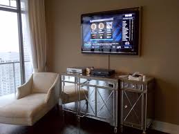 Hdmi cables hidden through the wall for wall mounted tv above fireplace. On Wall Wire Management With Wire Raceway Hiding Tv Cables