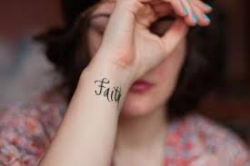 Here is a picture of pink sporting one of her tattoos. Wrist Flower Tattoos Lovetoknow