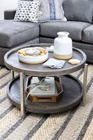 There has enough space where you can easily store the essential if you are inspired by modern design, this oslo round coffee table can be an attractive choice for your home. The Swell Coffee Table Features Sleek Nickel Finished Iron Legs And Oil Finished Acaci Coffee Table For Small Living Room Coffee Table Coffee Table Small Space