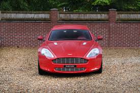 Image result for Magma Red 2011 Aston Martin