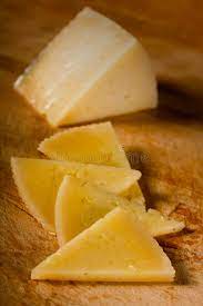 Four Slices And A Wedge Of Manchego Cheese Block Of Manchego Cheese And Four Sl Sponsored Advertisement Sponsored Wedge Manchego Cheese Manchego Food