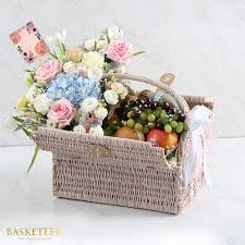 Send the gift of sweetness to your partner in crime, bff, or sibling with a candy bouquet from ftd. Flower Fruit Basket And Garland Basketeer The Ultimate Gifts