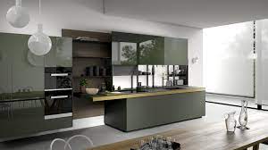 The kitchen appliances are concealed within the wall, along with storage cabinets. Elegant Italian Kitchen Design Opnodes