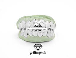 We did not find results for: Custom 10k 14k 18k White Gold Grillz 4 6 8 Piece Top Bottom Set Gold Slugz Grill Solids Perm Pullouts Gold Grillz White Gold Grillz Grillz