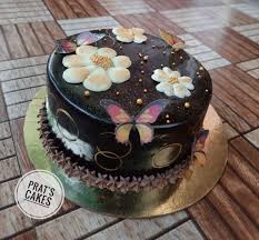 Check spelling or type a new query. Dutch Chocolate Cake With Edible Butterfly And Chocolate Flowers In Pune Cakexpo