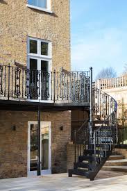 For our spiral garden, we decided to first put 8 small pieces, then a plant holder piece. London Garden Metal Balcony And Staircase Klassisch Balkon London Von British Spirals Castings Houzz