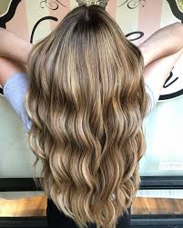 The hairstyle adopted in this diagram is very fascinating as this creates a mesmerizing look with the combination of black and blonde the blonde hairstyle with a fresh brown hair color is something modern. The Top 17 Dirty Blonde Hair Ideas For 2020 Pictures