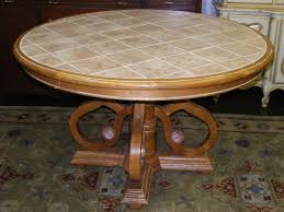 The perfect addition to your porch, patio, or sunroom, this charming table is perfect for holding books, playing board games and keeping drinks and snacks handy. Round Tile Top Dining Table Marva S Placemarva S Place