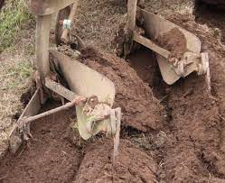 Dig a trench across the length of your garden by using a spade. How To Plough Or Plow A Field Basic Instructions 8 Steps With Pictures Instructables