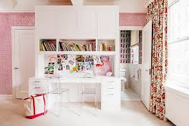 We designed these lofted bunkbeds so they could use the space underneath for desks and to play, she. Girls Room With Built In Desk Contemporary Girl S Room