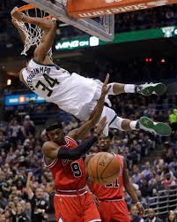 Milwaukee Bucks Giannis Antetokounmpo Dunks Over Chicago Bulls Rajon Rondo And Jimmy Butler During Mor Milwaukee Bucks Nba Basketball Art Nba Best Dunks