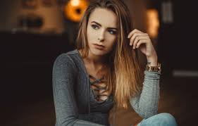 Beautiful woman with dark brown hair and blue eyes talking on her cell phone. Wallpaper Look Girl Watch Portrait Tattoo Brown Hair Blue Eyes Cleavage Blue Eyes Tattoo Women Face Look Clock Portrait Sideboob Images For Desktop Section Devushki Download