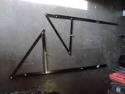 Metal brackets come in many shapes and sizes. 2 Ct Lot Steel Awning Brackets 5 Long Black No Additional Hardware Trs Consignment Auction Hardware Housewares Automotive Halloween And Christmas Decor Next To Last Auction At This Location Equip Bid