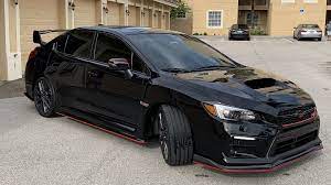 The stock emblems may help make your subaru a subaru, but their blue on chrome color scheme can really cramp your wrx or sti's styling in pretty short order. 2019 Black Subaru Wrx Sti With Carbon Fiber Lip Kit And Red Pin Stripe Sports Cars Luxury Street Racing Cars Wrx