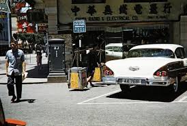 1959 junction of nathan and austin roads hong kong 香港 此相片拍攝於1959年 距今59年前 位置是九龍尖沙咀區的彌敦道及柯士頓道交界 此相片可能是經過執相處理 架私家車的車 history of hong kong hong kong repulse bay