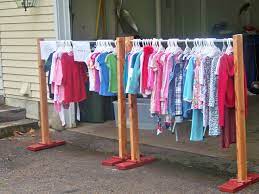 Use paper plates to separate sizes on a clothing rack. Home Daddy Creations Llc Rent Hangout Clothes Racks For Garage Yard Estate Sales Life Jackets Laun Diy Clothes Rack Yard Sale Clothes Diy Clothes Hangers