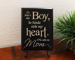 And when the father is old and feeble, he can always lean on his son's shoulders. Amazon Com So There S This Boy He Kinda Stole My Heart He Calls Me Mom Decorative Carved Wood Sign Quote Black Home Kitchen