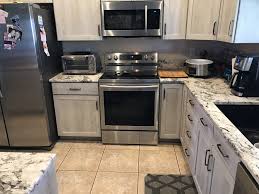 Most the cabinets were refaced and the damaged cabinets were replaced with custom made cabinets. Cabinet Refacing Kitchen Tune Up Cabinet Refacing Kitchen Prices Reface