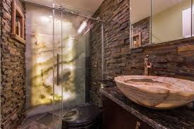 Charred reclaimed hemlock is carefully charred, misted with water, cooled, brushed and then stained/sealed. Unconventional Bathroom Wall Cladding Ideas