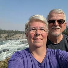 What are the must-see destinations and campgrounds for a road trip across  Canada from Alberta to Newfoundland?