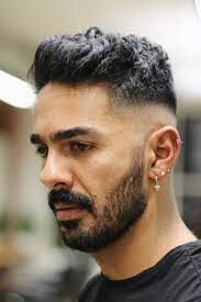 Wavy Quiff Mid Skin Fade Haircut Styled With The Regal Gentleman Matte Clay Watch The Video Of How To Get This Mid Skin Fade Fade Haircut Fade Haircut Styles