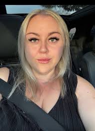 Can someone create a professional looking head shot with a white lab coat?