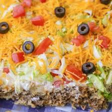 This Delicious Taco Casserole Is Like A Taco Salad In Casserole Form With A Ground Beef And Biscuit Base Plus La Mexican Food Recipes Recipes Baked Casserole