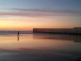Taxis & shuttles in tijuana. File Playas De Tijuana Fisherman At Border Fence Jpg Wikipedia