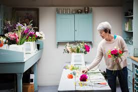 Choose a flower bouquet for delivery today: A Florist Creating A Hand Tied Bunch Of Fresh Flowers Minf07342 Mint Images Westend61