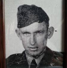 Please could someone make this photo of my dad clear? Its the only photo of  him in his uniform. Thank you in advance