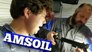 Cutting open AMSOIL Ea Motorcycle Oil Filter