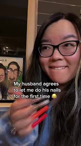 My husband and I with his and hers thumb #WWSuperstars for #SummerSlam 😂  @Peacock #nailart #peacockpartner