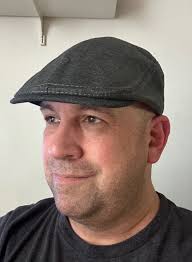 All right! I appreciate everyone who stopped by to give an opinion. That  said, I tallied the votes and 1) the number of people in favor of going  with a Newsie was