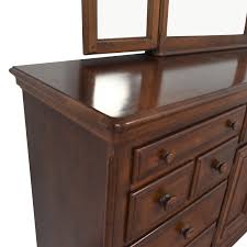 Made from pecan wood with select veneers, armoire features a rounded pediment at top and cabinet with double doors and space for a 32 television. 90 Off Alexander Julian Home Colours Alexander Julian Home Colours Dresser With Tri Fold Mirror Storage
