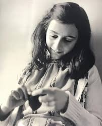 Anne Frank writing in her diary( R.I.P Anne Frank)