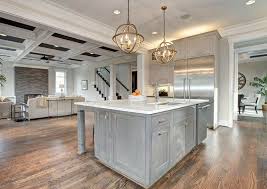 Kitchen With Slightly Distressed Gray Cabinets And Carrara Marble Countertops With Gold Gl Distressed Kitchen Cabinets Grey Kitchen Cabinets Distressed Kitchen