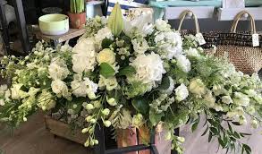 (other sizes available) 4 foot £195 5 foot £215. Classic All Whites Casket Spray Blossom Hill Flowers Danbury Essex