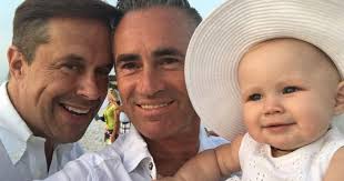 Entertainment mogul's new daughter is a happy frequent flyer